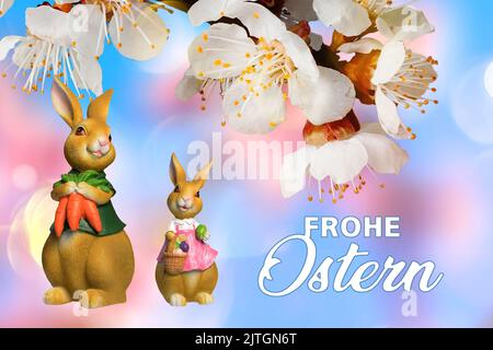 male Eastern bunny with daughter with Easter eggs and carrots in front of  blooming cherry twig, composing Stock Photo