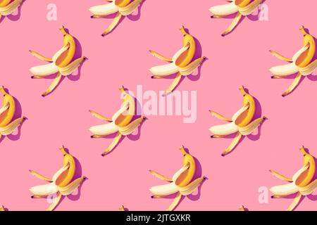 Yellow ripe bananas on pink background pattern, square. Minimal style. Flat lay. Stock Photo