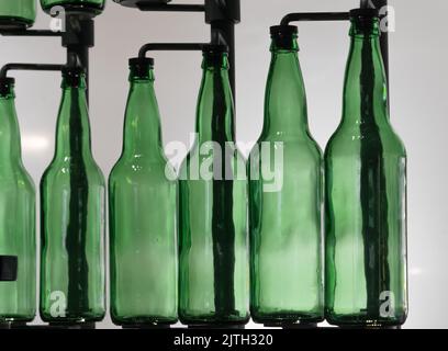 Row of see through green bottles Stock Photo