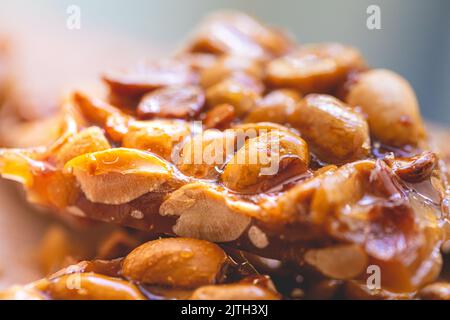 Brazilian peanut-based caramelized sweet that in Brazilian Portuguese is called 'pé de moleque' and which in English: peanut brittle Stock Photo