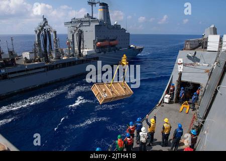Philippine Sea. 11th Aug, 2022. Sailors assigned to the forward-deployed amphibious transport dock ship USS New Orleans (LPD 18) receive stores from the underway replenishment oiler USNS Rappahannock (T-AO 204) during a replenishment-at-sea in the Philippine Sea. New Orleans, part of the Tripoli Amphibious Ready Group, along with the 31st Marine Expeditionary Unit, is operating in the U.S. 7th Fleet area of responsibility to enhance interoperability with allies and partners and serve as a ready response force to defend peace and stability in the Indo-Pacific region. (Credit Image: © U.S. N Stock Photo