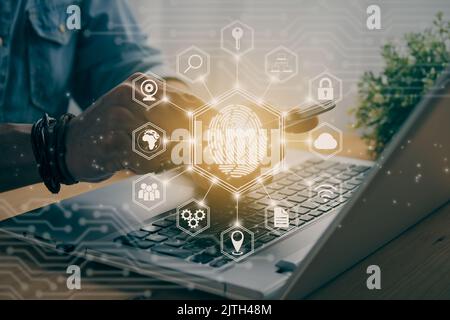 Casual Businessman Touching Mobile Phone or Smart Phone Screen and Hexagonal Fingerprint and Social Network Sign. Technology Communication and Securit Stock Photo
