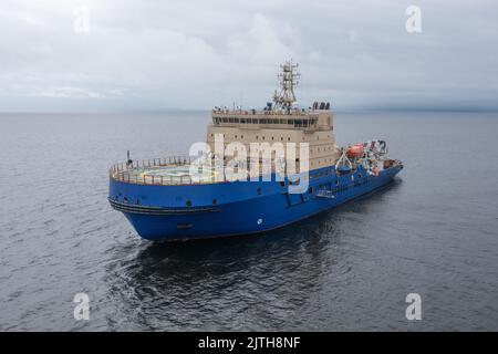 The ice breaker with a platform for helicopter landing, in the middle of a gulf. Stock Photo