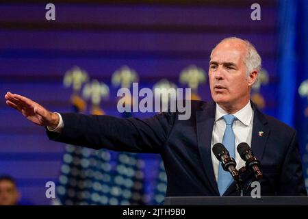 Wilkes Barre, United States. 30th Aug, 2022. United States Senator Bob Casey Jr. speaks at a Safer America rally with Joe Biden . President Joe Biden made a visit to Wilkes-Barre, Pennsylvania to discuss his plan to reform gun control, during his speech he touted beating the NRA. Biden is visiting cities for his Safer America plan. Credit: SOPA Images Limited/Alamy Live News Stock Photo