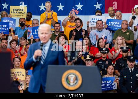 Wilkes Barre, United States. 30th Aug, 2022. Audience members cheer for Joe Biden. President Joe Biden made a visit to Wilkes-Barre, Pennsylvania to discuss his plan to reform gun control, during his speech he touted beating the NRA. Biden is visiting cities for his Safer America plan. Credit: SOPA Images Limited/Alamy Live News Stock Photo