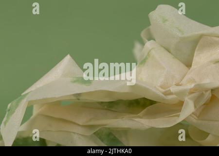 Background from crumpled paper with a green tint. Stock Photo