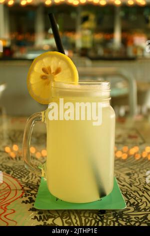 Mouthwatering Iced Lemonade in a Transparent Jar Stock Photo