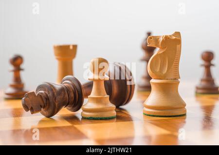 Concept with chess pieces - Checkmate Stock Photo