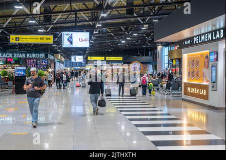 MOSCOW, RUSSIA - JULY 08, 2022: Sheremetyevo airport. flight information monitors and check-in in Sheremetyevo. airport check-in area Stock Photo