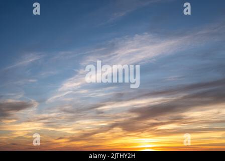 Colorful cloudy sky at sunset. Gradient color. Sky texture, abstract nature background. The blue sky with the light of the rising sun or sunset. Huge Stock Photo