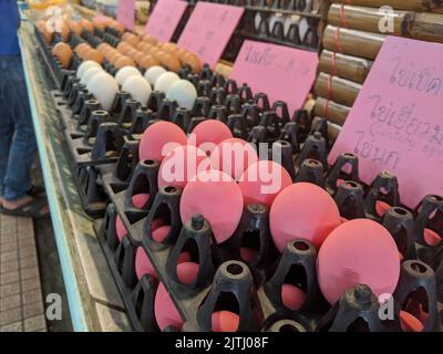 Century eggs on sale at a market stall in Thailand Stock Photo