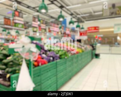 Abstract blurred supermarket vegetables aisles for background. - stock photo Stock Photo
