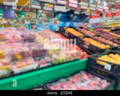 Abstract blurred supermarket fruits aisles for background. - stock photo Stock Photo