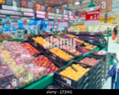 Abstract blurred supermarket fruits aisles for background. - stock photo Stock Photo