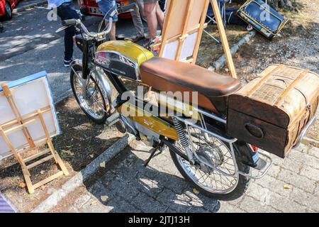 peugeot 103 sp chooper and mbk 51 motobecane caferacer french vintage retro  moped in style custom and racing parked in city street Photos