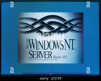 Brussels, Belgium - August 02, 2022:  Nineties obsolete Windows NT 95 logo on screen. A old operating system from Microsoft Stock Photo