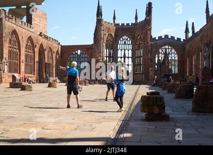 Tour guides at Coventry Cathedral, UK Stock Photo