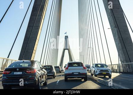 Afternoon traffic headed westbound on the ANZAC Bridge in Sydney, Australia Stock Photo