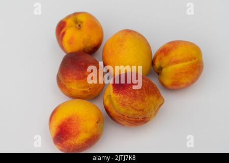 Fresh organic peach fruit isolated on white background Stock Photo