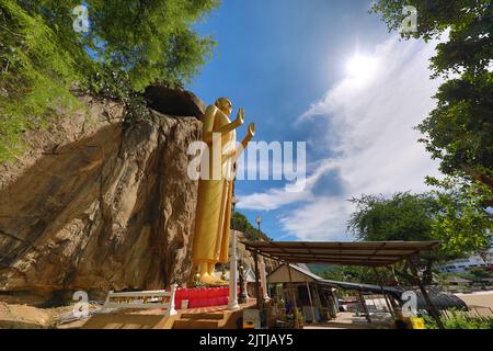 Gold buddha statue Phra Pang Haan Yad, Khao Takiab, Nong Kae, Hua Hin, Thailand Stock Photo
