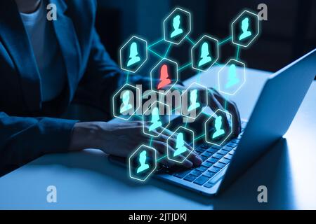 Conceptual image of social media, information spreading between people, networking, internet connection, viral marketing, communication. Business people in business suit using a laptop computer. Stock Photo