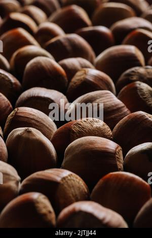 Closeup of some unopened hazelnuts filling the entire frame Stock Photo