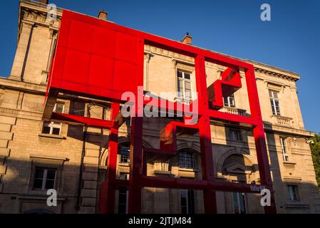 Red folly, one of 26 architectural representations of deconstruction made of metal and painted bright red that are dotted around the Parc de la Villet Stock Photo