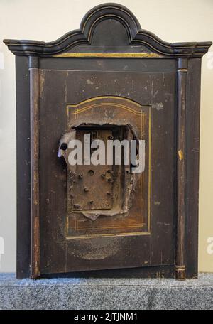 The vintage vault was forced open with safe-breaker tools Stock Photo
