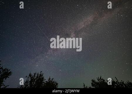 Milky Way and Stars Moving Across the Night Sky Stock Photo - Alamy