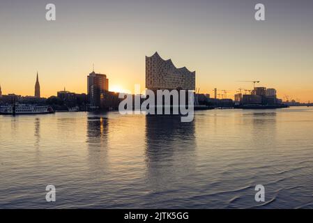 Sunrise at the Elbe Philharmonic Hall and Hafencity in the harbour of Hamburg, Germany Stock Photo