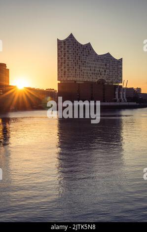 Sunrise at the Elbe Philharmonic Hall and Hafencity in the harbour of Hamburg, Germany Stock Photo