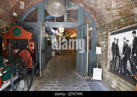 Sunbridge Wells, a maze of tunnels near City Park with quirky & independent retailers and lively bars, in Bradford, West Yorkshire, UK Stock Photo