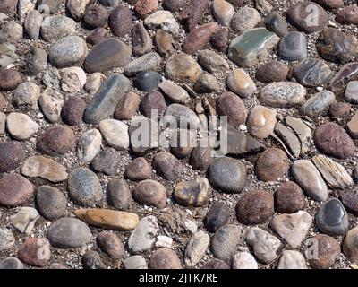 Path made of natural stone granite background Stock Photo