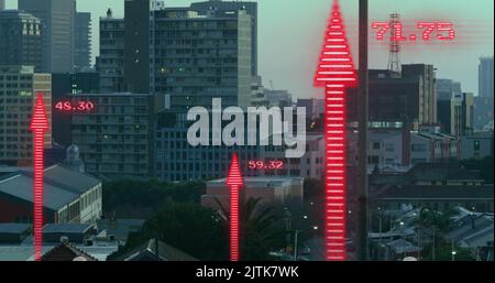 Image of financial data processing with arrows over cityscape Stock Photo