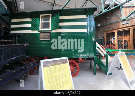 Historical wagons and horse drawn carts at Bradford Industrial Museum, West Yorkshire, UK Stock Photo