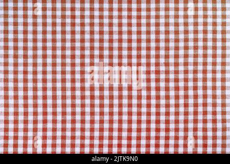 Red classic checkered tablecloth texture, background with copy space. Background texture checkered pattern fabric for cuisine, menu. Food mockup, temp Stock Photo