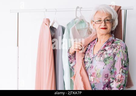 senior lady work fashion boutique business success Stock Photo