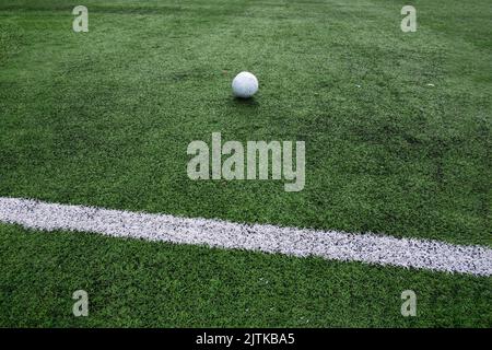 Close up of football field markings and a ball Stock Photo