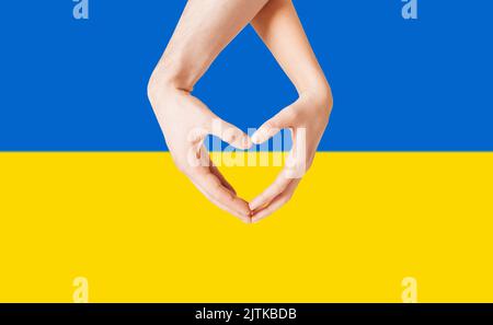 Donation concept. Heart and Ukrainian National colors with text