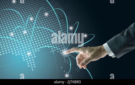 Right hand of a businessman touching digital globe to show business network growth to world wide Stock Photo