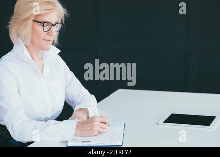 senior business lady day planning time management Stock Photo