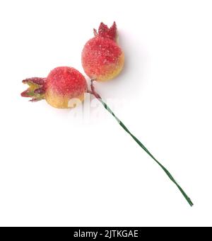 Artificial mini pomegranate  fruits for christmas decoration isolated on white Stock Photo