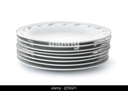 Front view of stacked clean ceramic dishes isolated on white Stock Photo