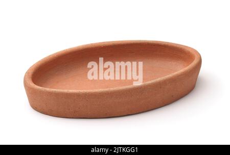 Empty oval clay baking pan isolated on white Stock Photo