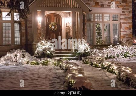 Toronto, ON, Canada – December 25, 2020: House decorated with lights ...