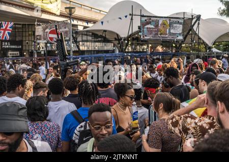 Music gathering near the Westway in Ladbroke Grove area, West London during the Notting Hill Carnival, 2022. Stock Photo