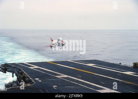 Douglas A-4 Skyhawk training aircraft conducting carrier quals at sea Stock Photo