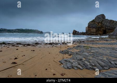 Rocky beach in the cantabrian coast, Playa de Portio, Liencres, Costa Quebrada, Pielagos, Cantabria, Spain Stock Photo