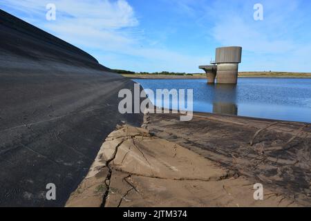 Colliford reservoir on Bodmin Moor showing dangerously low water levels. Stock Photo