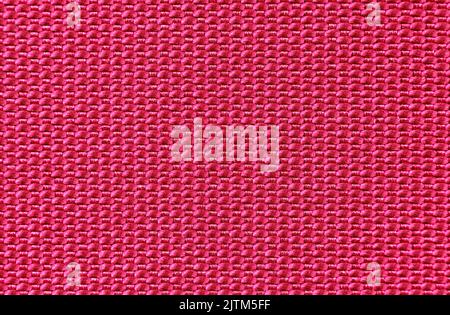 The texture of the fabric is red in small stripes. Material with straight lines Stock Photo